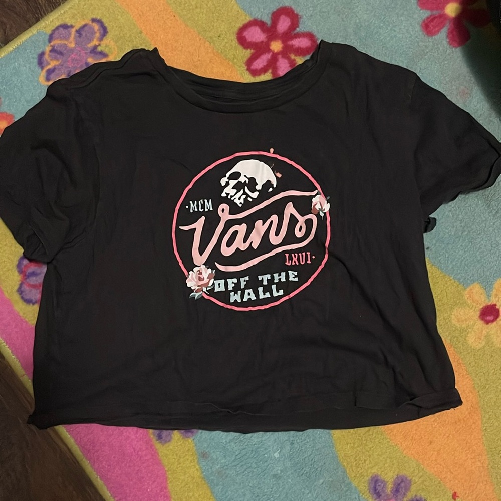 A black vans shirt will come with 2 surprise products